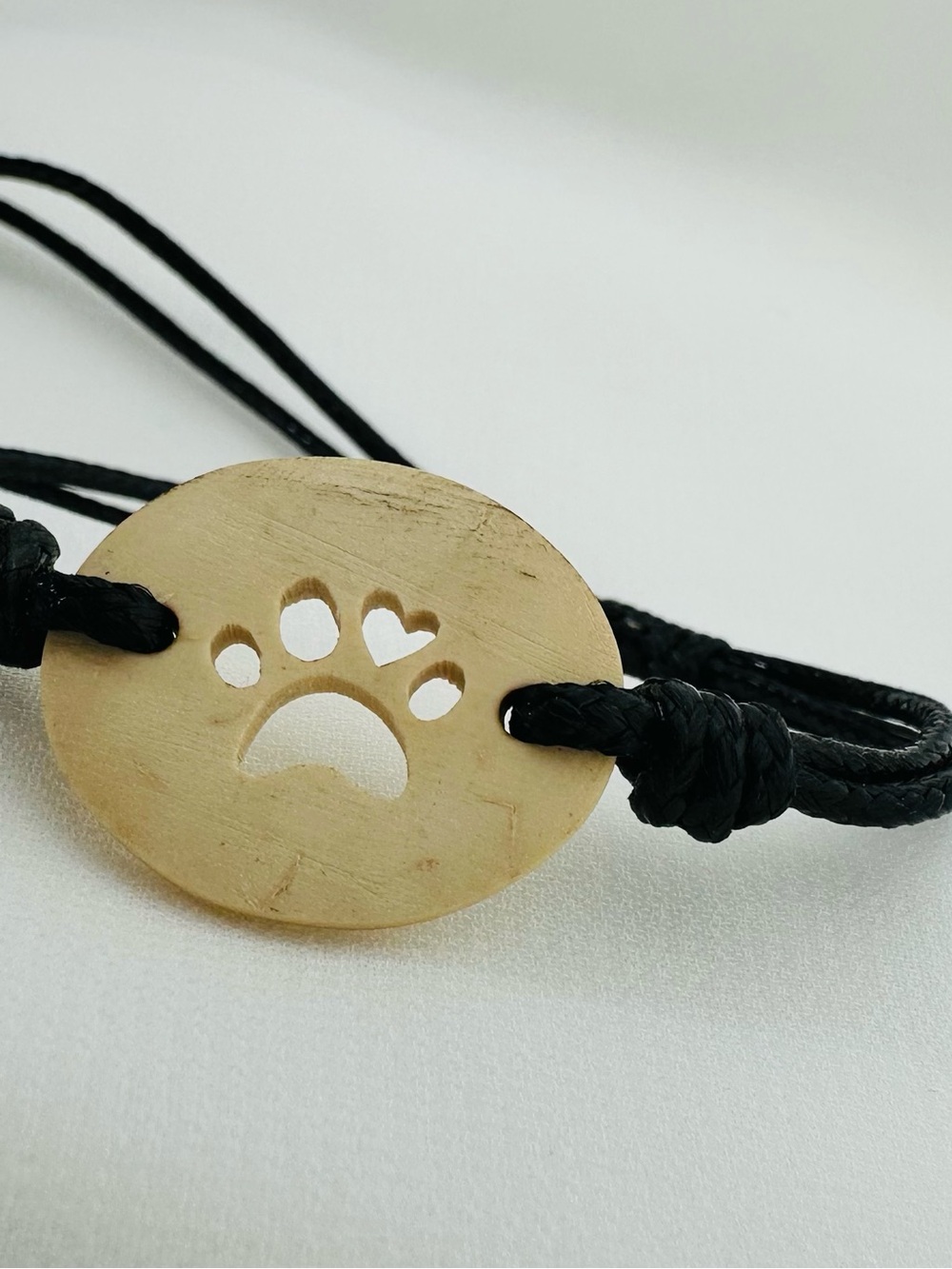 Handmade Coconut Shell Paw Print Bracelet Guatemala Black Cord